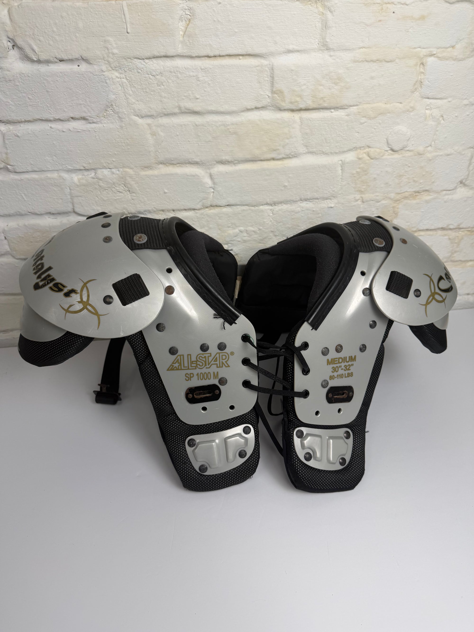 WHITE RAWLINGS SHOULDER PADS